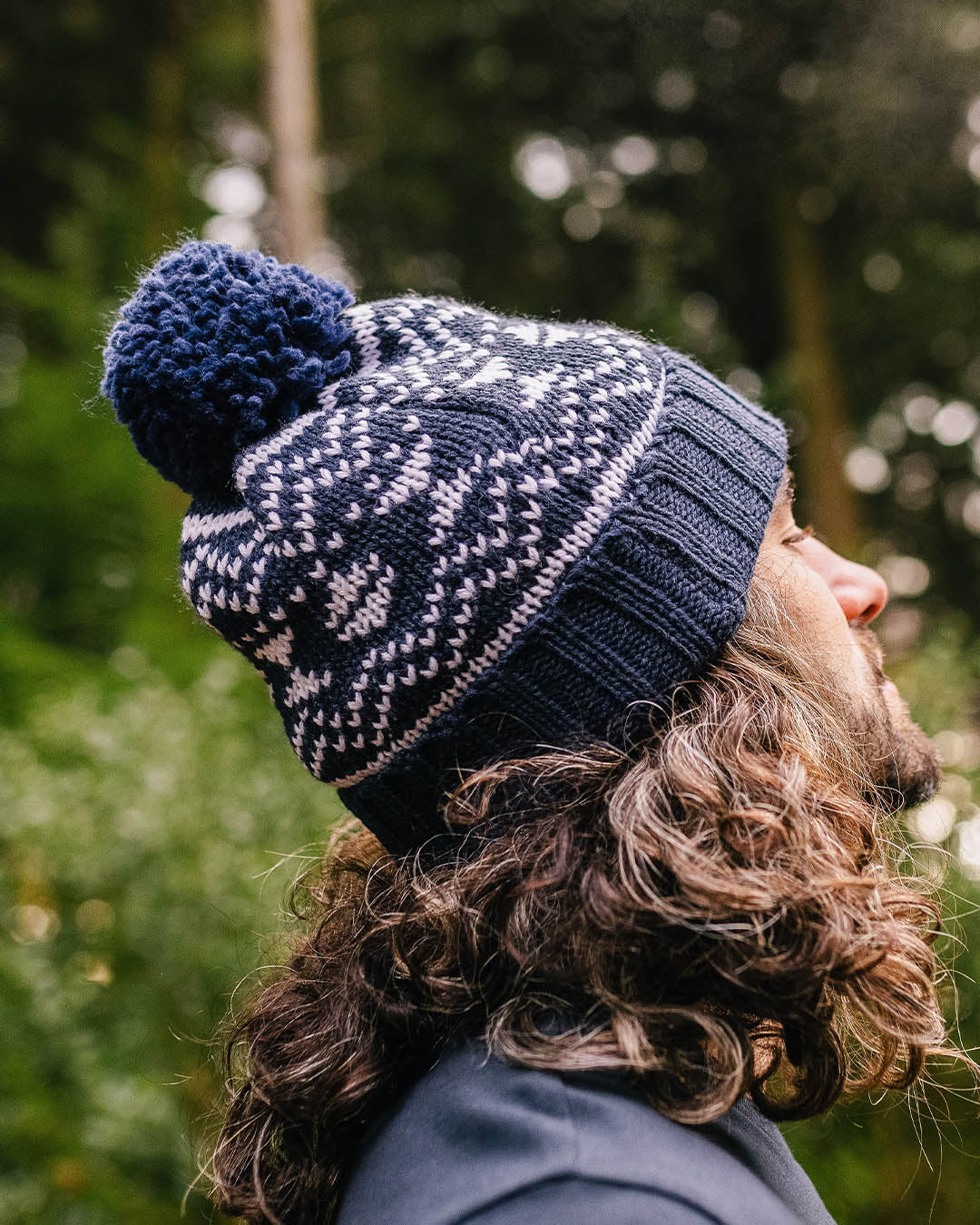 Navy bobble shop hat